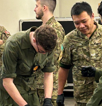 Cadets standing in formation indoors during the directed activity