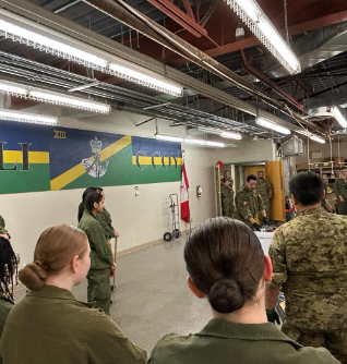 Cadets lined up along the wall during the indoor activity